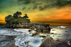 A stunning view of Tanah Lot at sunset time.